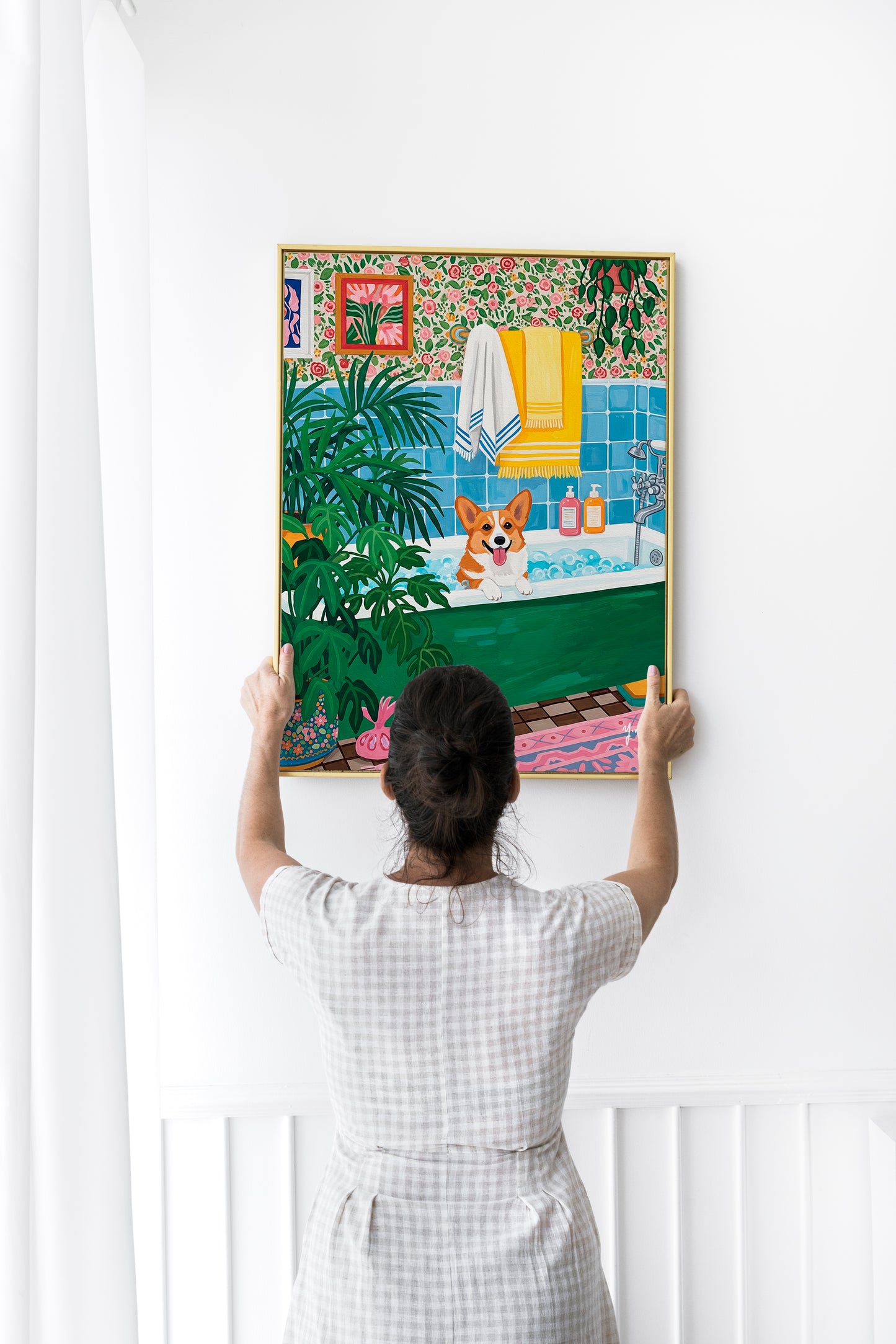 Cute Goldendoodle dog enjoying a bubble bath in a vintage green bathtub with pink tiles and houseplants around, joyful and cozy bathroom art print.