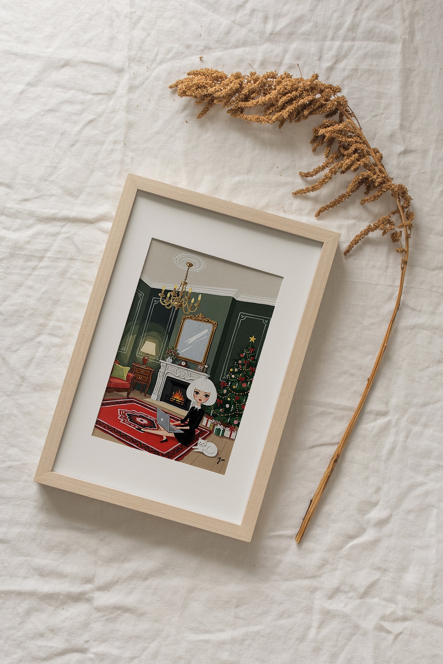 Illustration of a chic woman with short white hair sitting on a red rug using a laptop beside a fireplace, with a decorated Christmas tree and a white cat resting nearby in a cozy holiday interior.