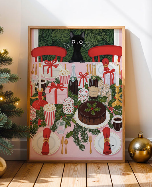  A vibrant and detailed art print depicting a black cat looking down from above onto a fully decorated Christmas dinner table. The table is set with red chairs white plates with red napkins silver cutlery bottles of champagne a chocolate cake with holly gifts candles and popcorn boxes all surrounded by green holly garlands.