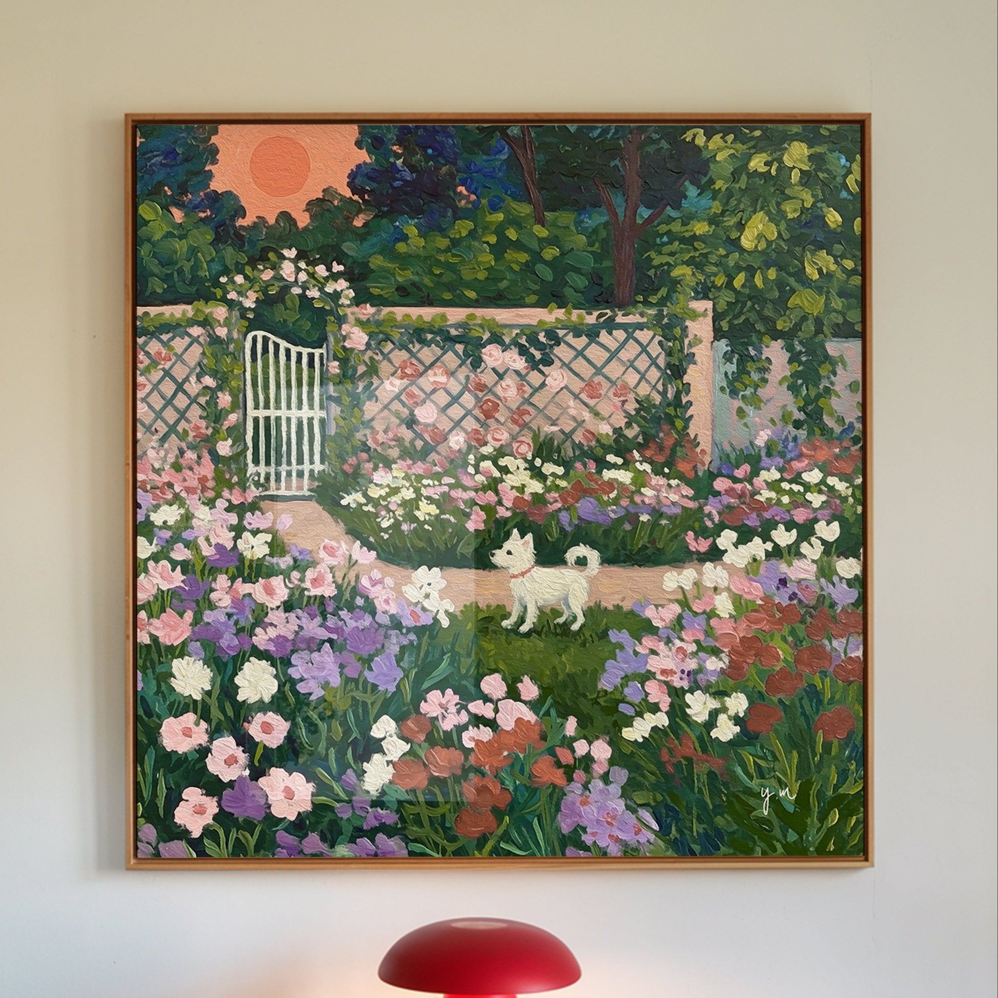 Whimsical landscape art print of a white dog walking through a colorful flower garden with a rose-covered wall and white gate at sunset.