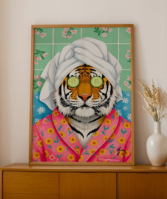 Whimsical illustration of a tiger wearing a pink floral robe and a towel wrap with cucumber slices on its eyes, sitting in a pastel bathroom.