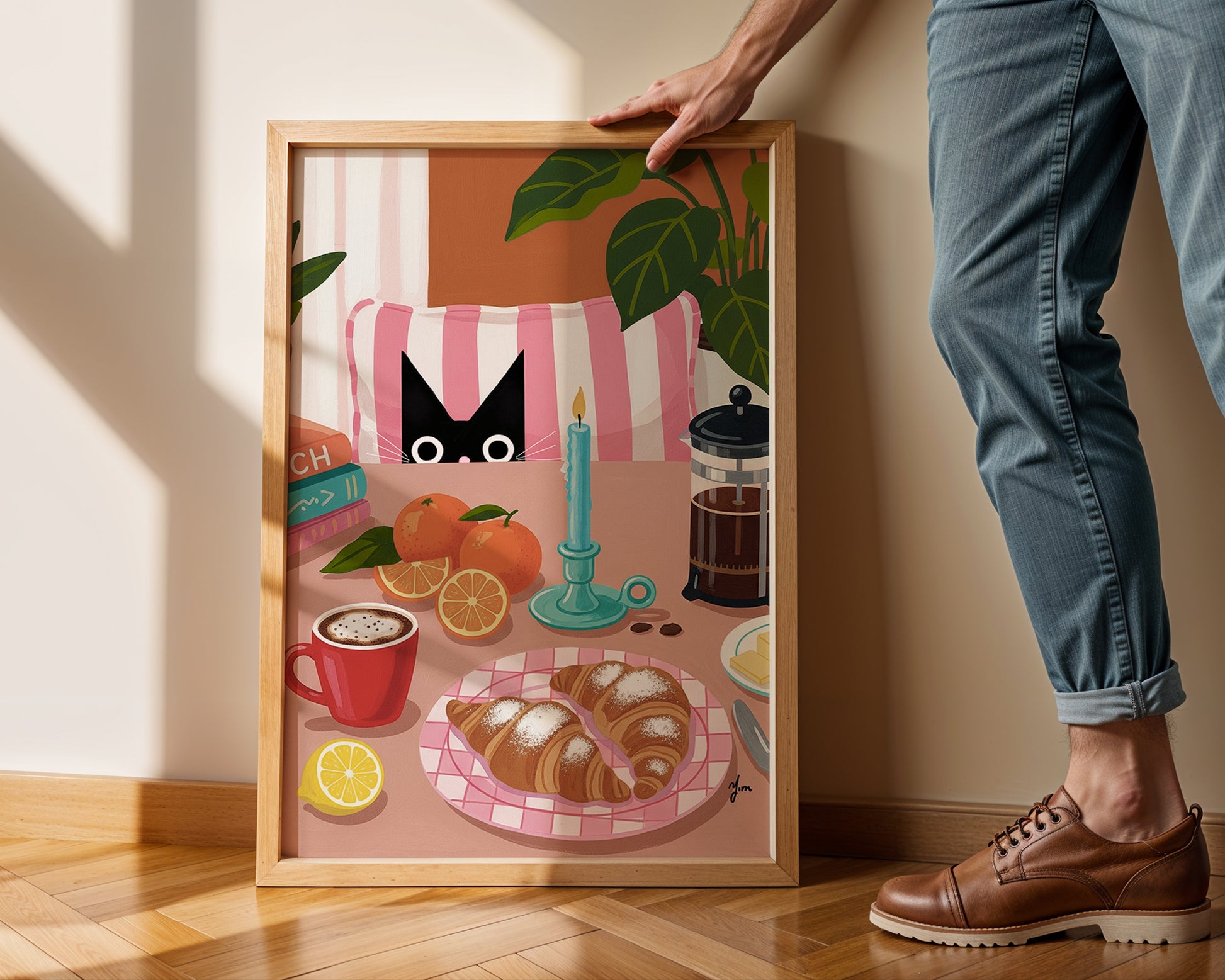 This whimsical art print by Yunamoona features a black cat peeking behind a striped pillow, a warm croissant breakfast, fresh oranges, and a French press coffee scene. Perfect for kitchen or dining wall decor, cat lovers, and brunch enthusiasts. Bring warmth and playful elegance into your home with this detailed and cheerful illustration.