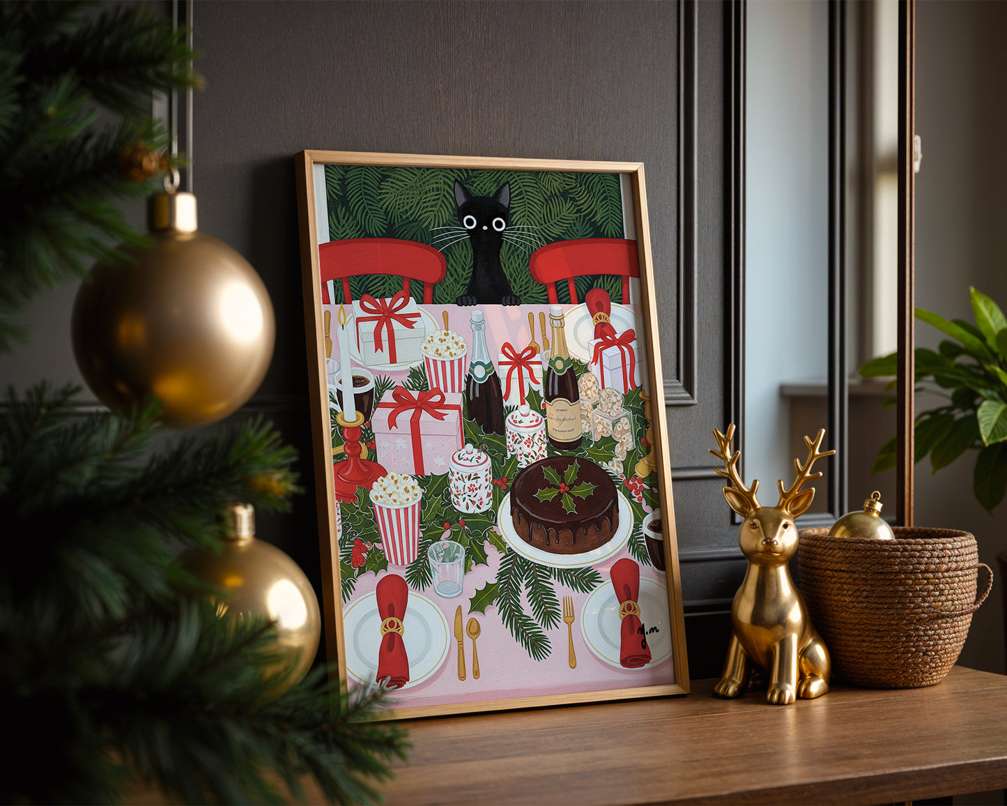  A vibrant and detailed art print depicting a black cat looking down from above onto a fully decorated Christmas dinner table. The table is set with red chairs white plates with red napkins silver cutlery bottles of champagne a chocolate cake with holly gifts candles and popcorn boxes all surrounded by green holly garlands.