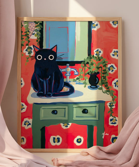 Black cat sitting on green sink with red floral wallpaper and hanging plants in whimsical bathroom scene