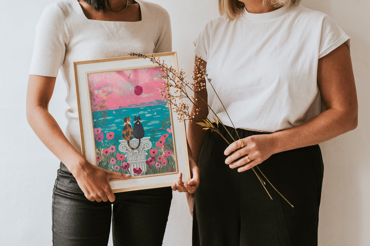 Two cats watching a seaside sunset floral garden painting coastal romantic cat art by YunaMoona